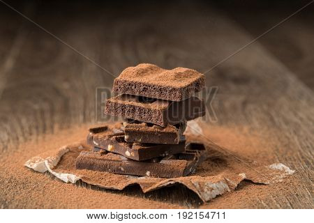 Pyramid of chocolate on table