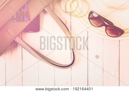 Womens mobile shopping during summer vacation .