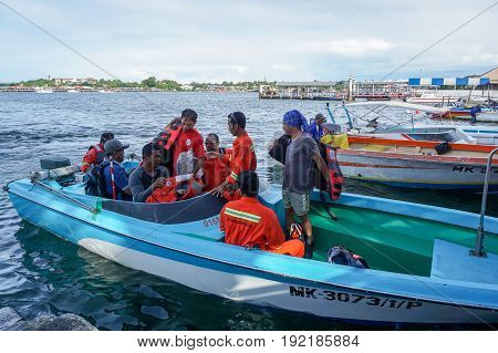Labuan, Malaysia-June 15,2017:Offshore workers on transport boat,ready to platform supply vessel (PSV) offshore support vessel at sea of Labuan,Malaysia.