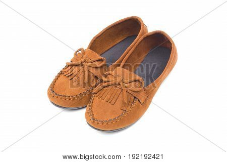 A pair of brown moccasins isolated on white
