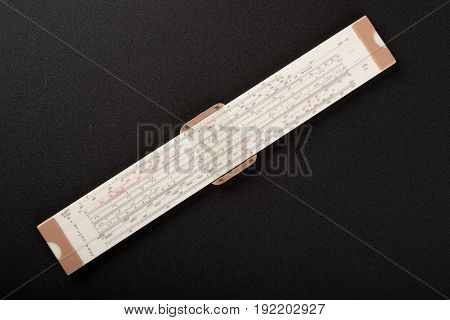 professional vanitation pipe ruler on top of black sand paper