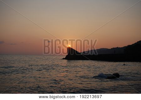 Sunset above mountains around sochi fisherfolk black see
