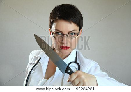 Portrait of a beautiful and sexy female doctor in a hospital.