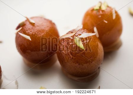 Indian Sweet food called Gulab Jamun made up of milk and sugar, a popular dish in festival or special occasion. Selective focus