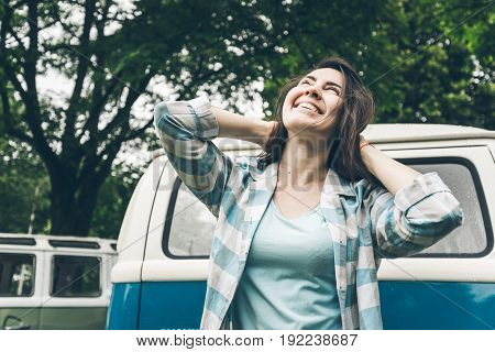 woman injoy her trip on van even in rainy weather