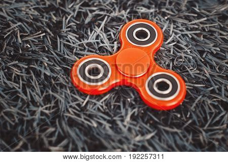 Top view of the popular spinner on a green artificial lawn