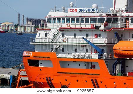 Labuan,Malaysia-June 15,2017:View of platform supply vessel (PSV) offshore support vessel,ready to the offshore oil production fields from port at Labuan,Malaysia.