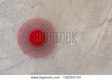 Red Fidget Spinner Stress Relieving Toy On Wooden Background