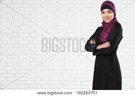 Beautiful young woman looking at camera make up white blue