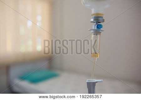 Close up  IV saline solution drip for patient hospital.