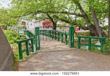 HIROSAKI JAPAN - MAY 23 2017: Ichiyo-bashi Bridge of Hirosaki Castle Japan. Castle was erected by Tsugaru Nobuhira in 1611 designated National Historic Site in 1952