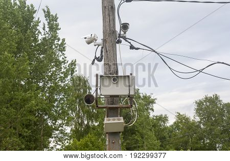 shot of speeed control camera on wooden pillar