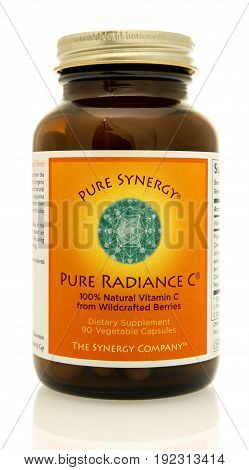 Winneconne WI - 4 June 2017: A bottle of Pure Synergy radiance vitamin C capsules an isolated background
