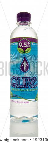 Winneconne WI -13 June 2017: A bottle of Qure drinking water on an isolated background