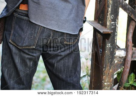 attractive folded men's denim jeans , denim business, human ass, butt, fabric industry, fashion design for male
