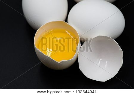 Fresh Eggs On The Black Background