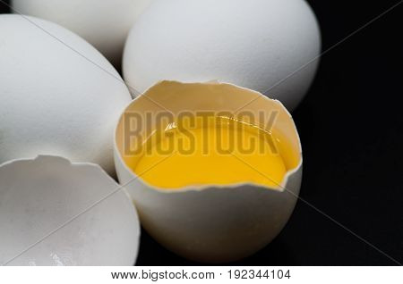 Fresh Eggs On The Black Background