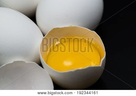 Fresh Eggs On The Black Background