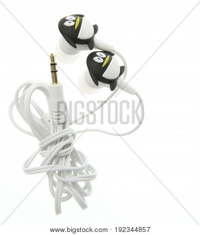 black earphone with penquin design isolated on white