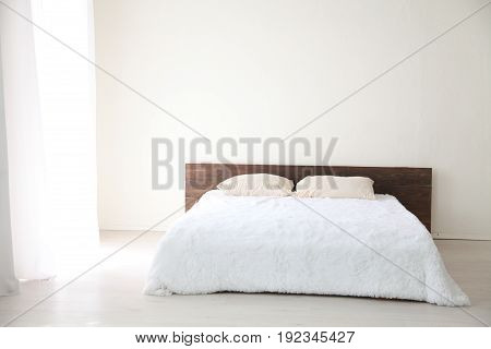 Interior white bedroom this morning with bed 1