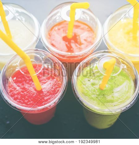 Colored Smothies Take Away In Plastic