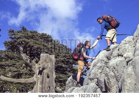 Help support and help in a dangerous situation to hike in the mountains.