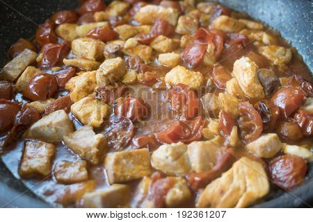 mixed fish and tomatoes as condiment for pasta called misto mare