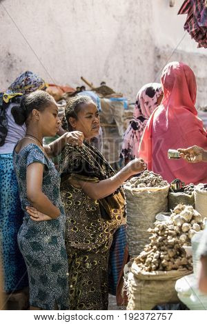 HARAR, ETHIOPIA-MARCH 31, 2017: Unidentified people buy and sell spices in Harar, Ethiopia
