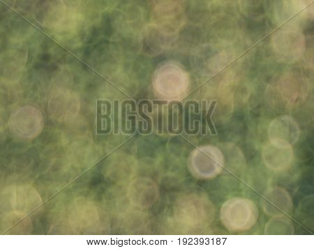 blurred background with green and yellow bokeh circles vintage lens