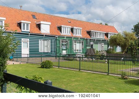 MARKEN NETHERLANDS - AUGUST 27 2016: Typical wooden houses on the former island Marken in the netherlands