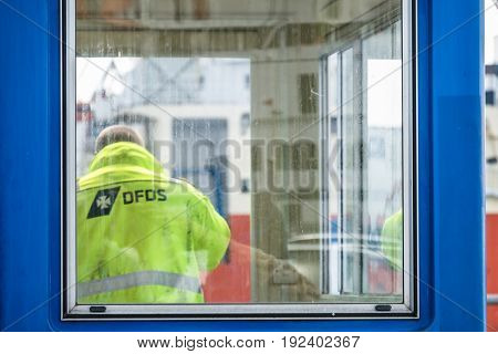 IJMUIDEN NETHERLANDS - MAY 12 2017 : Worker getting the ferry ready for the passengers