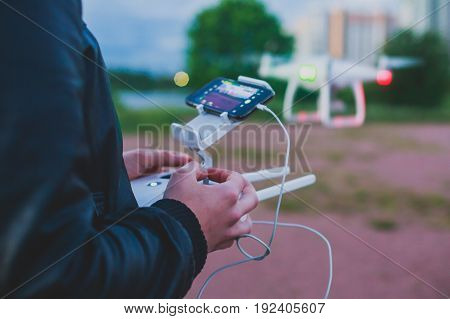 A process of launching the quadcopter drone with camera, operator pilot launches quadcopter uav, unmanned aerial vehicle flying