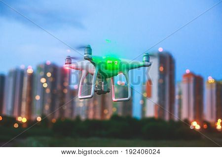 A process of launching the quadcopter drone with camera, operator pilot launches quadcopter uav, unmanned aerial vehicle flying