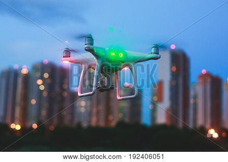 A process of launching the quadcopter drone with camera, operator pilot launches quadcopter uav, unmanned aerial vehicle flying