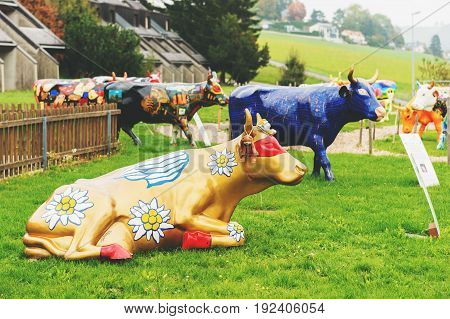 GRUYERE SWITZERLAND - APRIL 29 2014: swiss Restoroute Motel de la Gruyère presenting exposition with Poya cows decorated by local artists