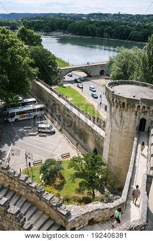 Tourists On Wall Of Palais Des Papes In Avignon