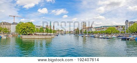 Panoramic view of historic Zurich city center with famous Fraumunster Grossmunster and St. Peter and river Limmat at Lake Zurich on a sunny day with clouds in summer Canton of Zurich Switzerland