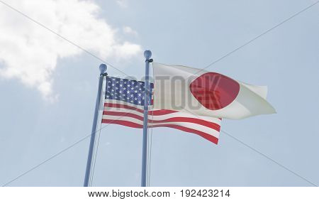 USA and Japan, two flags waving against blue sky. 3d illustration