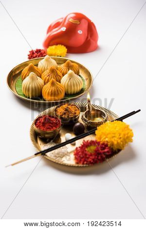 A modak is an Indian sweet dumpling popular in many parts of India. It is called modak in Marathi and Konkani as well as Gujarati language, Kozhakkatta in Malayalam, modhaka or kadubu in Kannada