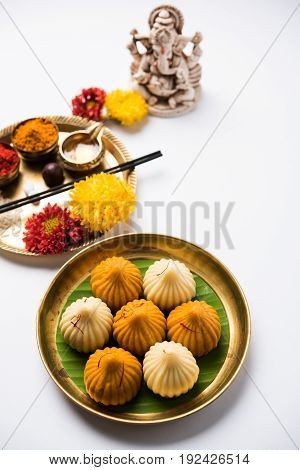 A modak is an Indian sweet dumpling popular in many parts of India. It is called modak in Marathi and Konkani as well as Gujarati language, Kozhakkatta in Malayalam, modhaka or kadubu in Kannada