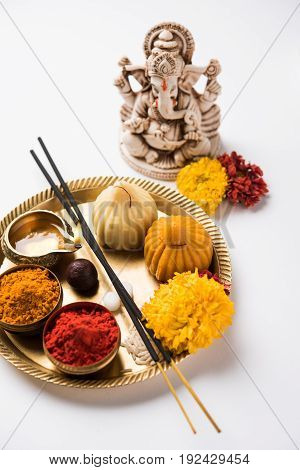 A modak is an Indian sweet dumpling popular in many parts of India. It is called modak in Marathi and Konkani as well as Gujarati language, Kozhakkatta in Malayalam, modhaka or kadubu in Kannada