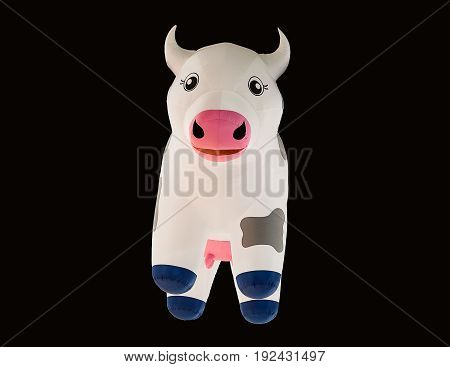Cow swim tube isolated on black background.Inflatable unicorn.Fantasy Swim Ring for Summer Pool Trip