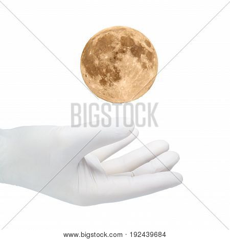 A hand in a white glove catches the moons.