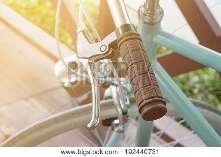 Handlebar of a bicycle on natural bokeh background. Travel and exercise concept