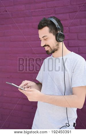 Man Using A Tablet.