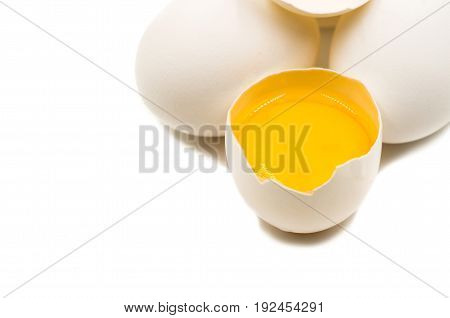 fresh eggs with yellow yalk on the black background