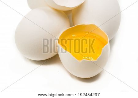 fresh eggs with yellow yalk on the black background