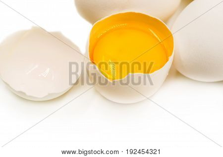 fresh eggs with yellow yalk on the black background