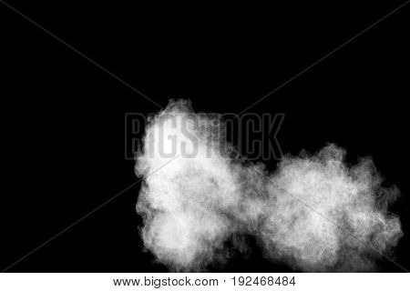 white Powder explosion on black background. White dust explode.