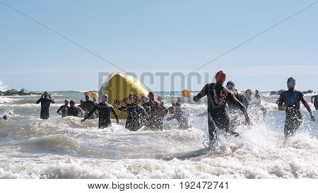 Pescara Italy - June 18 2017: Starting for the swimming test of the athletes of the Ironman 70.3 Pescara of June 18 2017